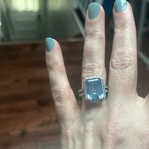 Emerald Cut Light Blue Diamonique Halo Ring
